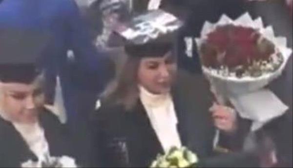 فصل طالبة عراقية في حفل التخرج بسبب صورة "صدام حسين"