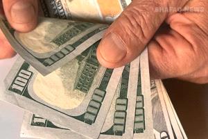 دولار العراق يتراجع قليلًا في بغداد وأربيل
